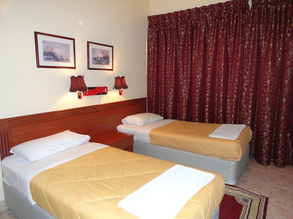 Lavender Hotel Apartments Dubaï Chambre photo